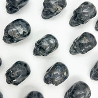 Larvikita Calavera | Agotamiento - Protección